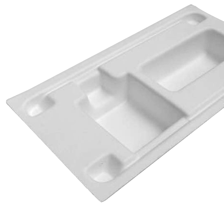 Wet press moulded pulp tray